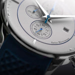 Matthew Mercury details chronograph watch, white face and light blue hands.