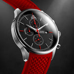 Matthew Mercury Watch with a red strap and black dial on a dark background