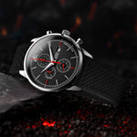 Black wristwatch with detailed face on a dark textured background